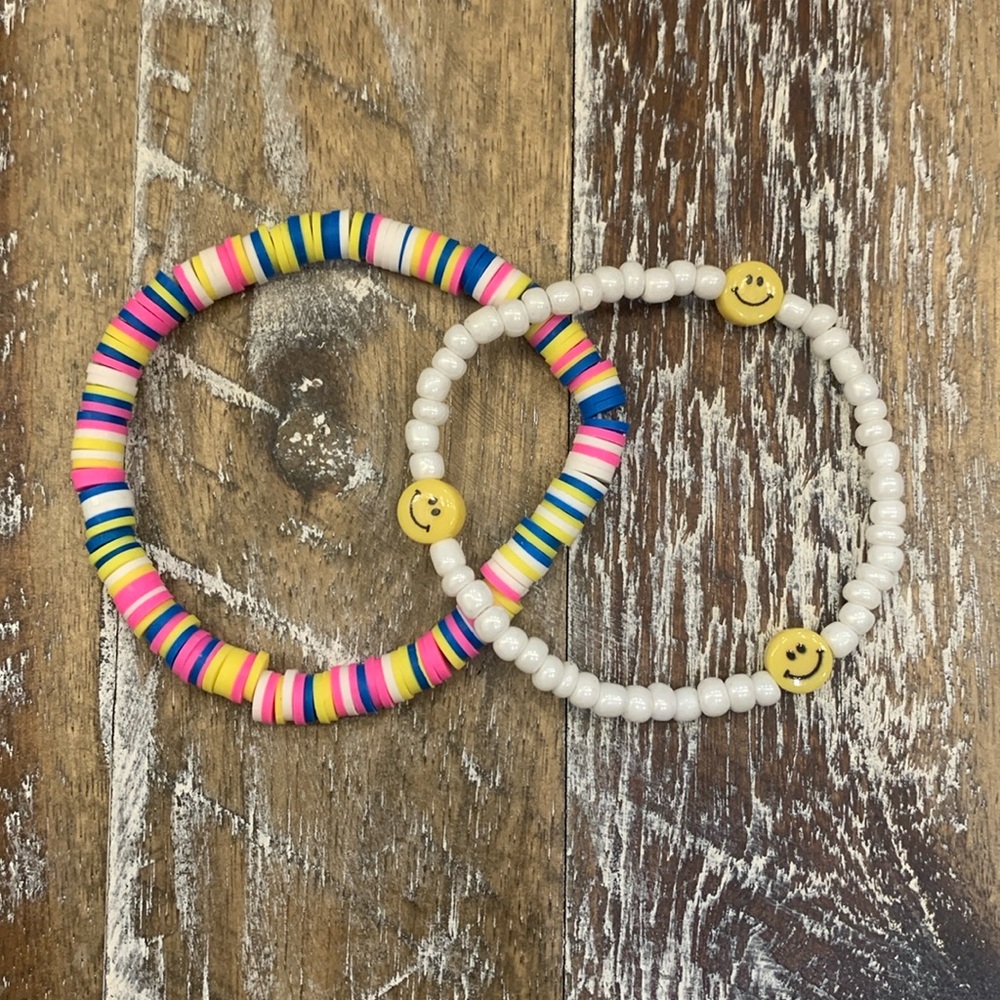 Two very bright and happy clay bead, and pony beaded bracelets